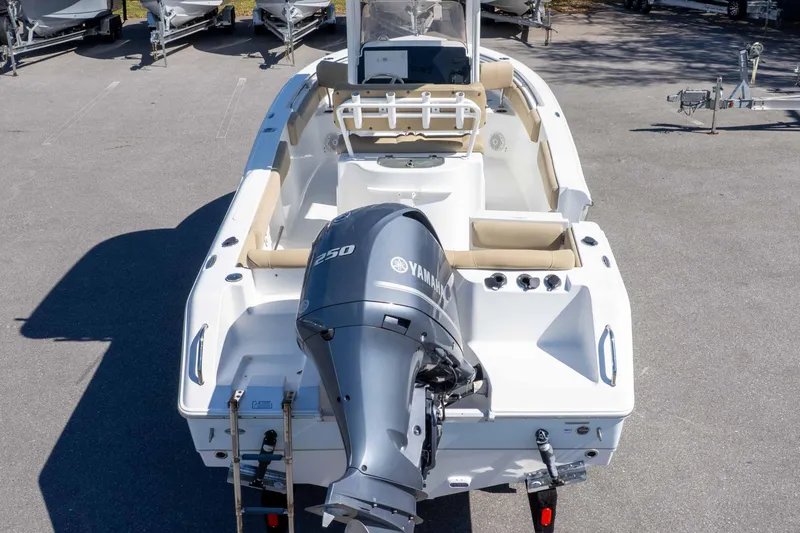 Slide: The Image of 2017 Sea Hunt Ultra 235 SE boat with Yamaha 250 engine, parked on pavement. - 51