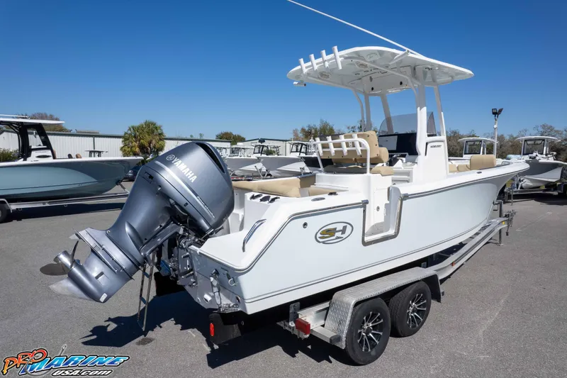Slide: The Image of 2017 Sea Hunt Ultra 235 SE boat with Yamaha engine on trailer, sunny day. - 53