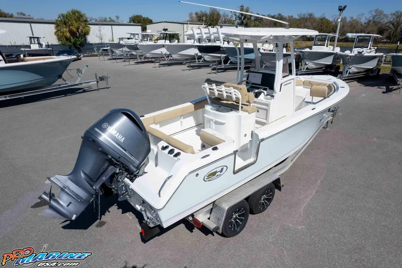 Slide: The Image of 2017 Sea Hunt Ultra 235 SE boat with Yamaha outboard engine on trailer. - 54