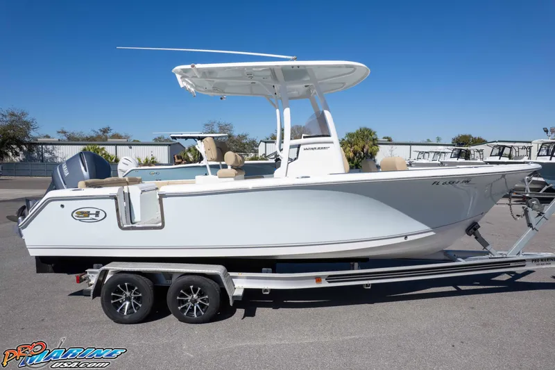 Slide: The Image of 2017 Sea Hunt Ultra 235 SE boat on trailer, side view. - 56