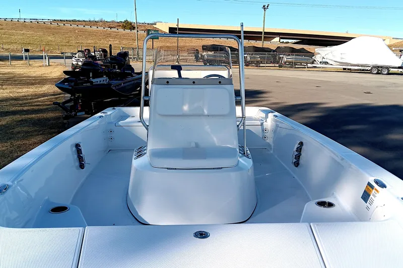 Slide: The Image of 2026 Frontier 180 boat interior with seating and storage compartments. - 10