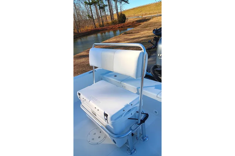 Slide: The Image of 2026 Frontier 180 boat with 115 HP outboard motor, rear deck view. - 16