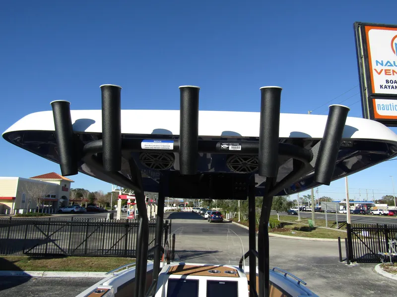 Slide: The Image of 2024 Starcraft SVX 231 OB CC boat with rod holders and speakers. - 32