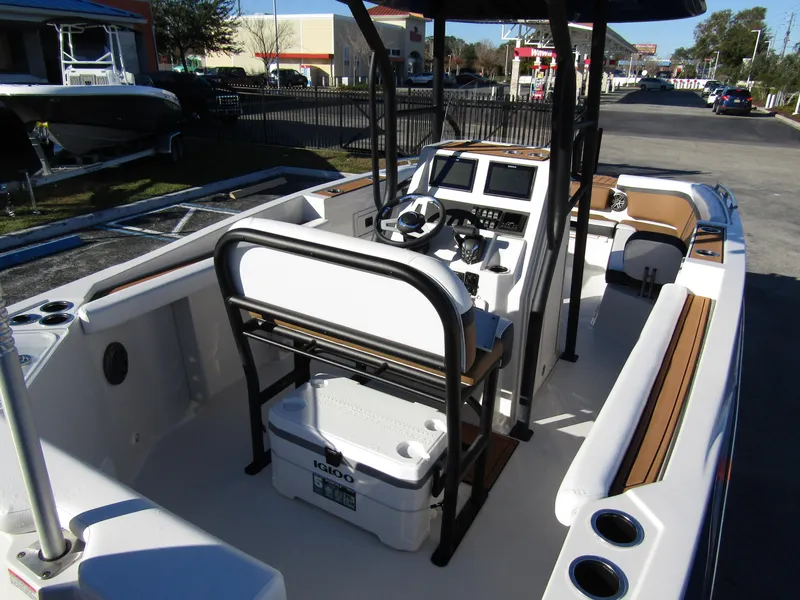 Slide: The Image of 2024 Starcraft SVX 231 OB CC boat interior with console and seating. - 34