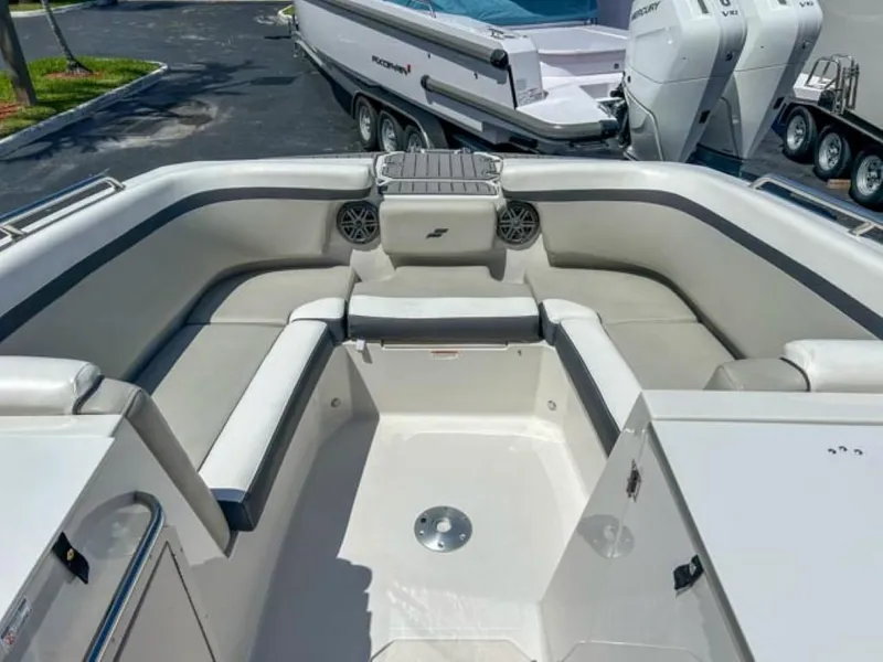 Slide: The Image of 2024 Starcraft SVX 231 OB DH boat interior with spacious seating and modern design. - 3