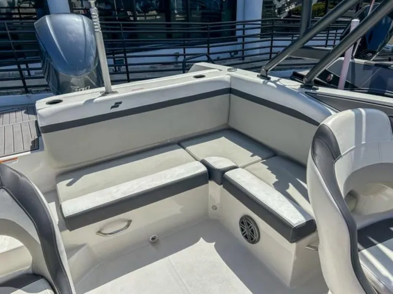 Slide: The Image of 2024 Starcraft SVX 231 OB DH boat interior with cushioned seating and modern design. - 8