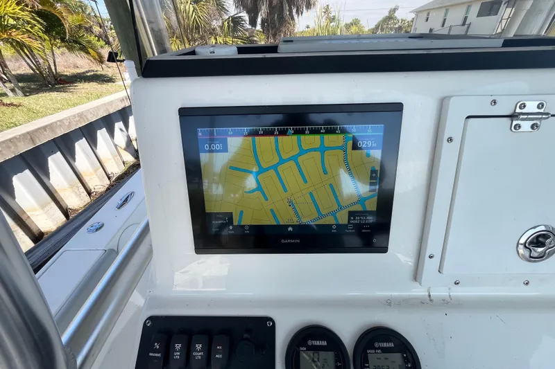 Slide: The Image of Garmin navigation display on 2022 KenCraft 239 Bay Rider boat dashboard. - 25