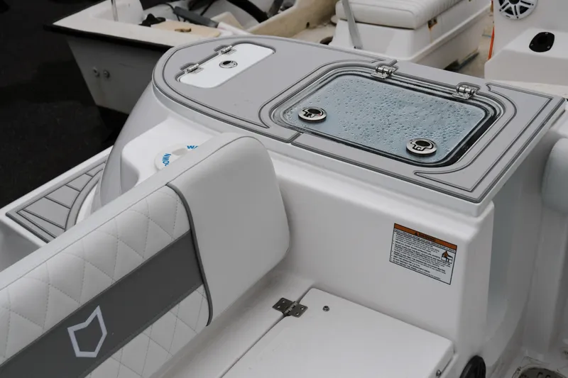 Slide: The Image of 2026 Sea Fox 228 Commander boat interior with wet deck and seating. - 13