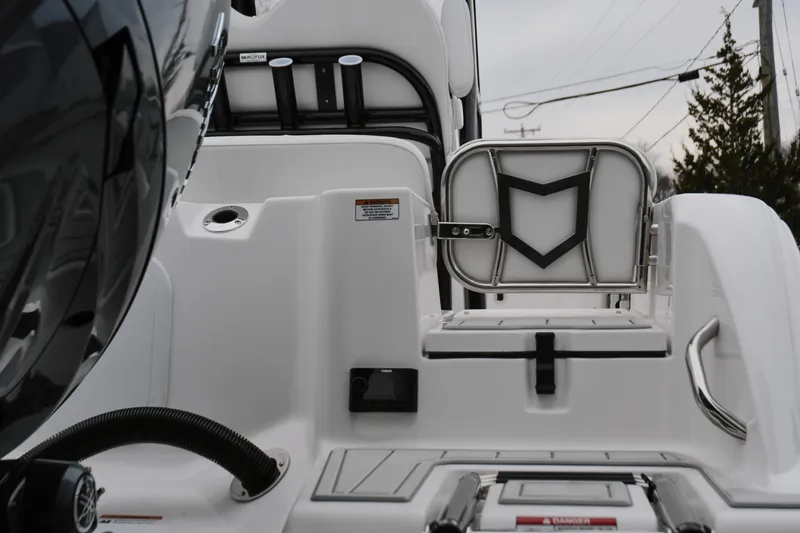 Slide: The Image of 2026 Sea Fox 228 Commander boat interior with seating and storage features. - 16