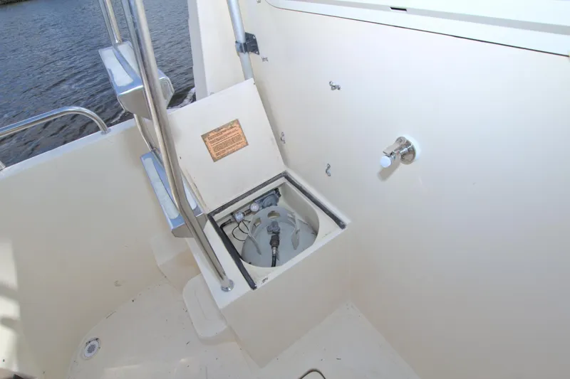 Slide: The Image of 2004 Camano 31 Troll boat deck with open hatch and water view. - 13