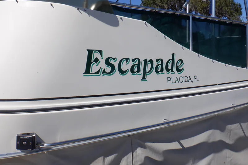 Slide: The Image of 2004 Camano 31 Troll boat named "Escapade" in Placida, FL. - 5