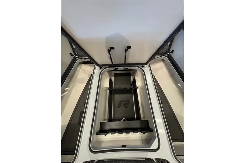 Slide: The Image of 2026 Ranger Z519R boat storage compartment with sleek design and secure latches. - 12