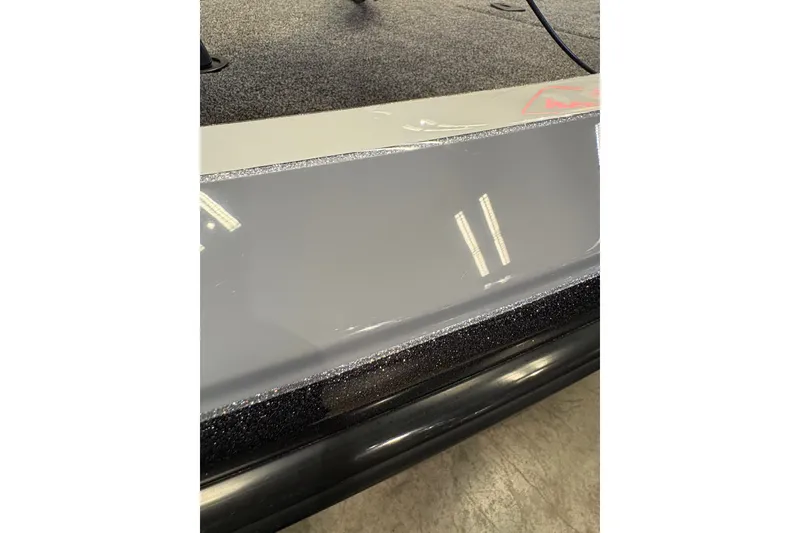 Slide: The Image of 2026 Ranger Z519R boat deck with sleek, glossy finish and textured surface. - 6