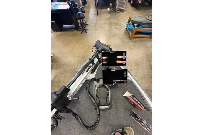 Slide: The Image of 2026 Ranger Z519R boat dashboard with dual electronic displays and control panel. - 9