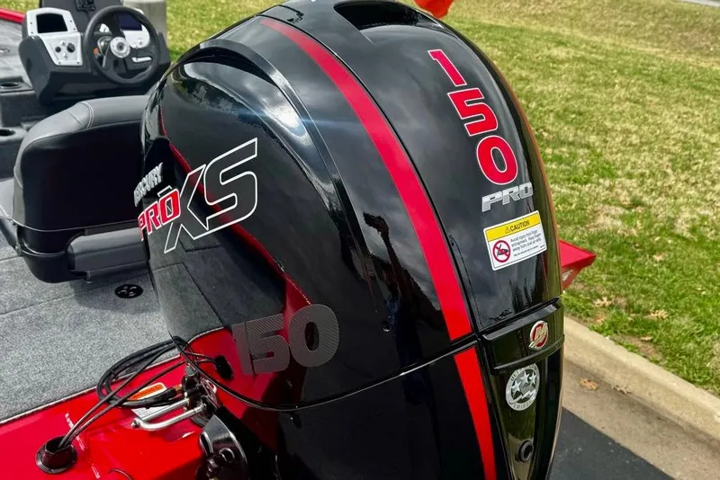 Slide: The Image of 2026 Tracker Pro Team 195 boat with Mercury Pro XS 150 engine, outdoor setting. - 5
