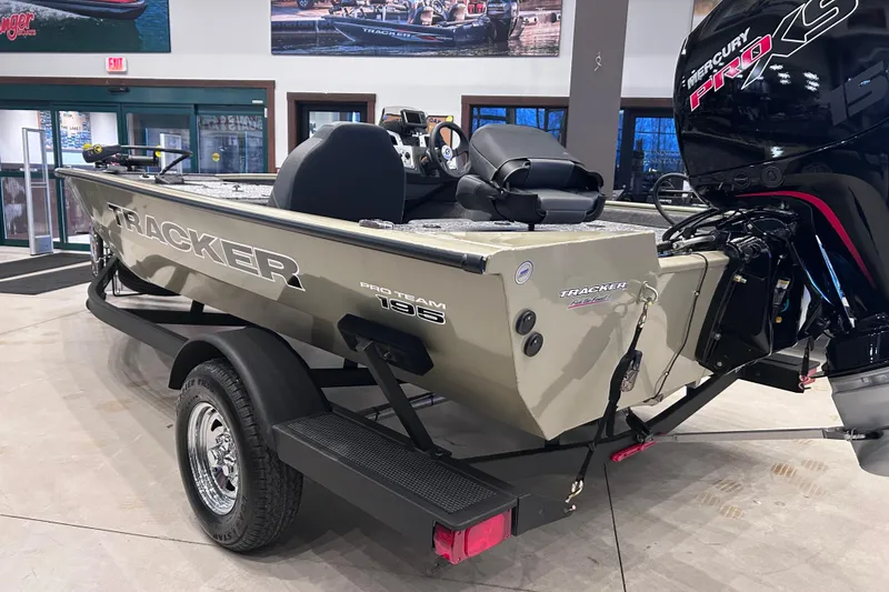 Slide: The Image of 2026 Tracker Pro Team 195 boat on display with Mercury Pro XS engine. - 10