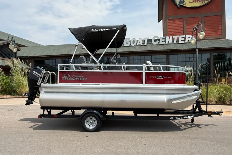 The Image of 2026 Sun Tracker Bass Buggy 16 XL Select pontoon boat at a boat center. - 0