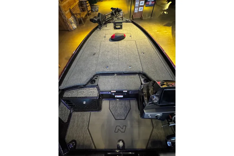 Slide: The Image of 2026 Nitro Z21 XL Pro boat interior with advanced dashboard and spacious deck. - 4