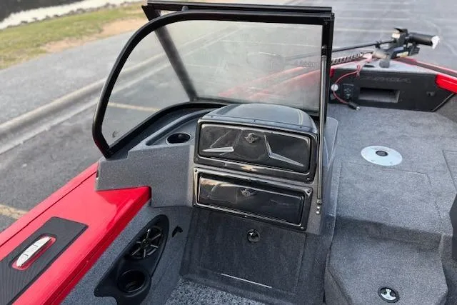 Slide: The Image of 2026 Tracker Targa V-18 WT boat interior with windshield and storage compartments. - 114