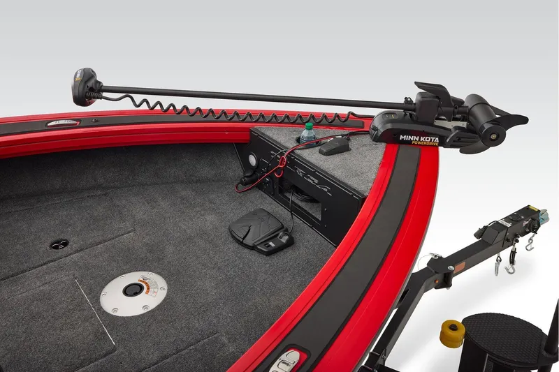 Slide: The Image of 2026 Tracker Targa V-18 WT boat interior with gray seating and red accents. - 18