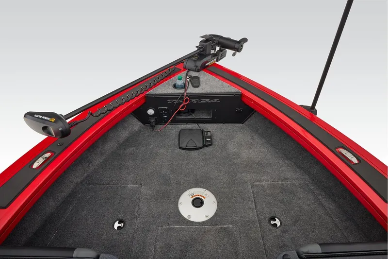 Slide: The Image of 2026 Tracker Targa V-18 WT boat interior with steering wheel, dashboard, and Lowrance device. - 20