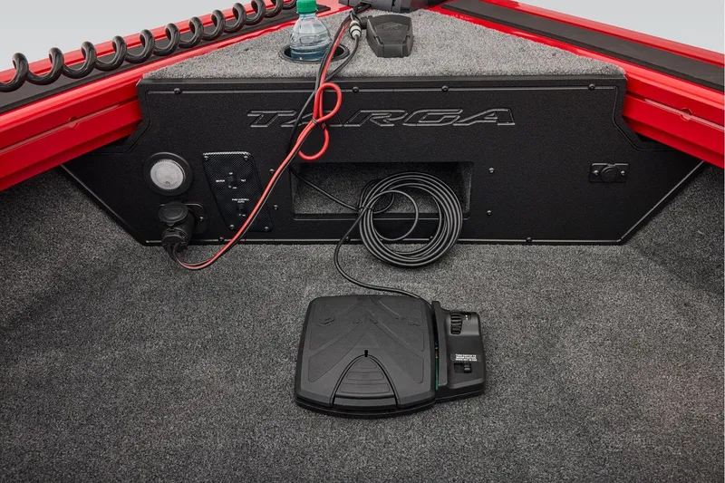 Slide: The Image of 2026 Tracker Targa V-18 WT boat dashboard with steering wheel and Lowrance display. - 21