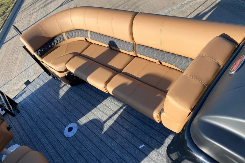 Slide: The Image of Luxurious tan seating on 2026 Ranger 220FC boat, featuring stylish design and comfortable upholstery. - 7