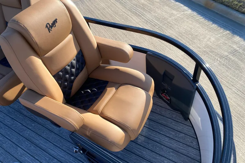 Slide: The Image of Luxurious tan and black seat on 2026 Ranger 220FC boat, featuring premium stitching and design. - 9