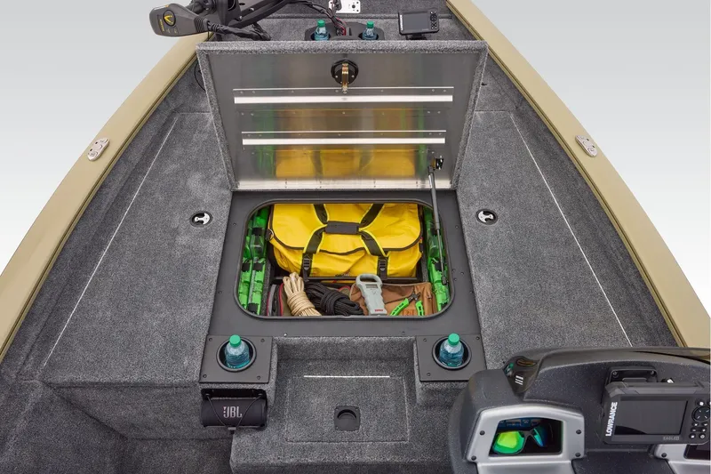 Slide: The Image of Interior of 2026 Tracker Pro Team 175 boat showing control panel and safety labels. - 22