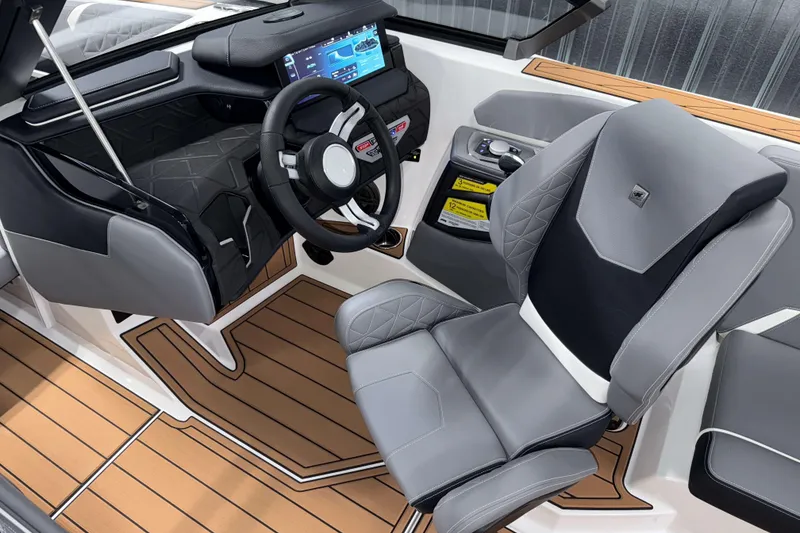 Slide: The Image of 2026 Nautique Super Air Nautique GS20 interior with modern dashboard and luxurious seating. - 15
