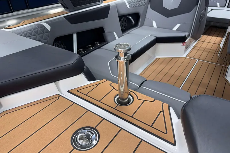 Slide: The Image of 2026 Nautique Super Air Nautique GS20 interior with sleek seating and polished deck details. - 7
