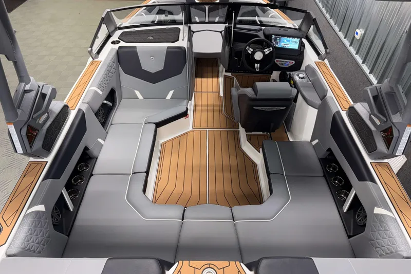 Slide: The Image of 2026 Nautique Super Air Nautique GS20 interior with sleek seating and modern dashboard design. - 8
