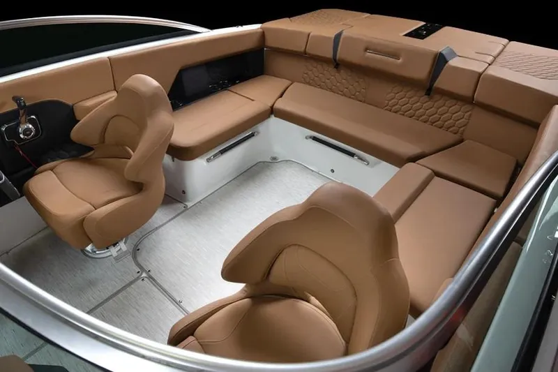 Slide: The Image of Luxurious interior of 2026 Four Winns H4 boat with tan leather seating. - 4