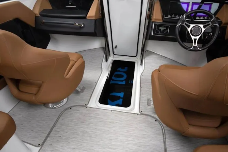 Slide: The Image of Interior of 2026 Four Winns H4 boat with brown seats and modern dashboard. - 9