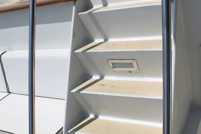 Slide: The Image of Staircase on a 1984 Broward CPMY Raised Pilothouse yacht. - 19