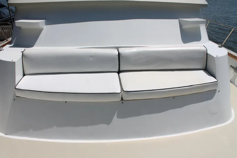 Slide: The Image of White seating on a 1984 Broward CPMY yacht. - 23