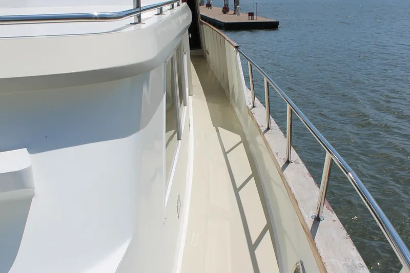 Slide: The Image of Broward CPMY Raised Pilothouse 1984 at dock, side view. - 24