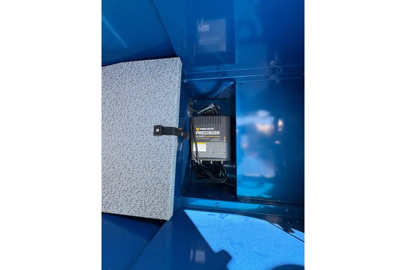 Slide: The Image of 2026 Lund 1775 Adventure SS boat interior with Minn Kota Precision charger. - 14