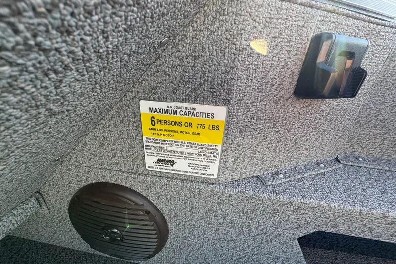 Slide: The Image of 2026 Lund 1775 Adventure SS boat capacity label, maximum 6 persons or 775 lbs. - 18