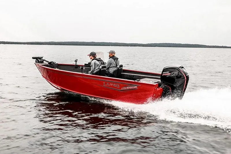 Slide: The Image of Manufacturer Provided Image: 2026 Lund 1775 Adventure SS boat cruising on a lake with two passengers. - 26