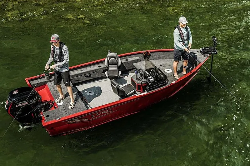 Slide: The Image of Manufacturer Provided Image: 2026 Lund 1775 Adventure SS boat with two people fishing on calm water. - 28