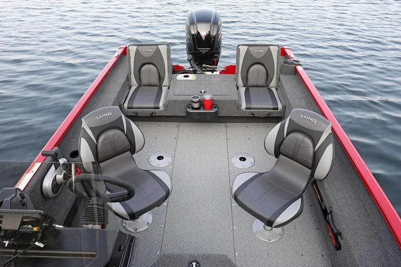 Slide: The Image of Manufacturer Provided Image: 2026 Lund 1775 Adventure SS boat interior with four seats on calm water. - 31