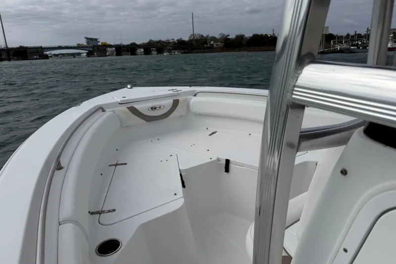 Slide: The Image of 2012 Sea Hunt Ultra 211 boat on trailer, side view, cloudy sky background. - 5