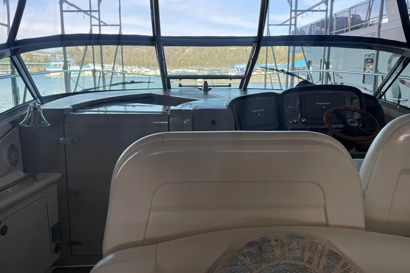 Slide: The Image of 2007 Sea Ray Sundancer 400 helm with panoramic marina view. - 11