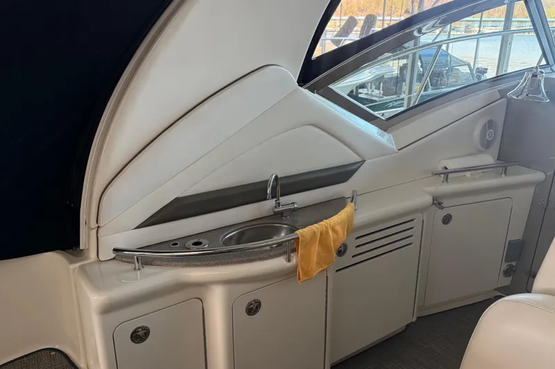 Slide: The Image of Interior of a 2007 Sea Ray Sundancer 400 yacht with sink and cabinetry. - 12