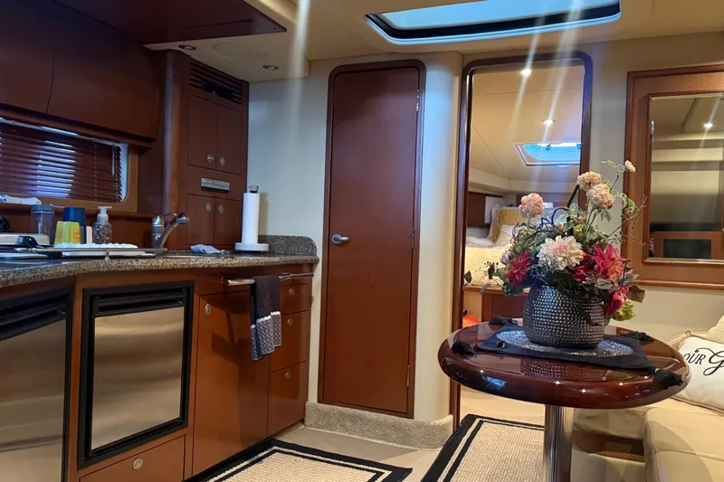 Slide: The Image of Luxurious interior of 2007 Sea Ray Sundancer 400 yacht with elegant decor and modern amenities. - 24
