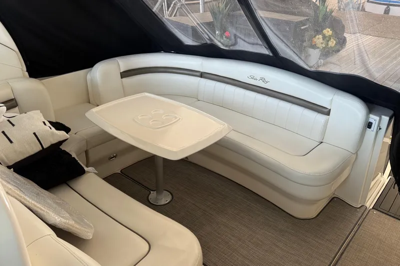 Slide: The Image of Luxurious interior of 2007 Sea Ray Sundancer 400 yacht with plush seating and table. - 9