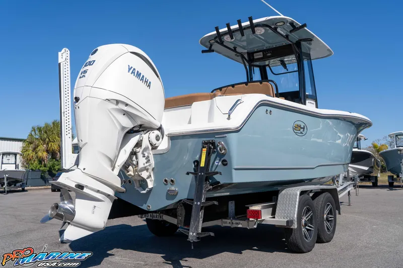 Slide: The Image of 2023 Sea Hunt Ultra 255 SE boat with Yamaha engine on trailer. - 10