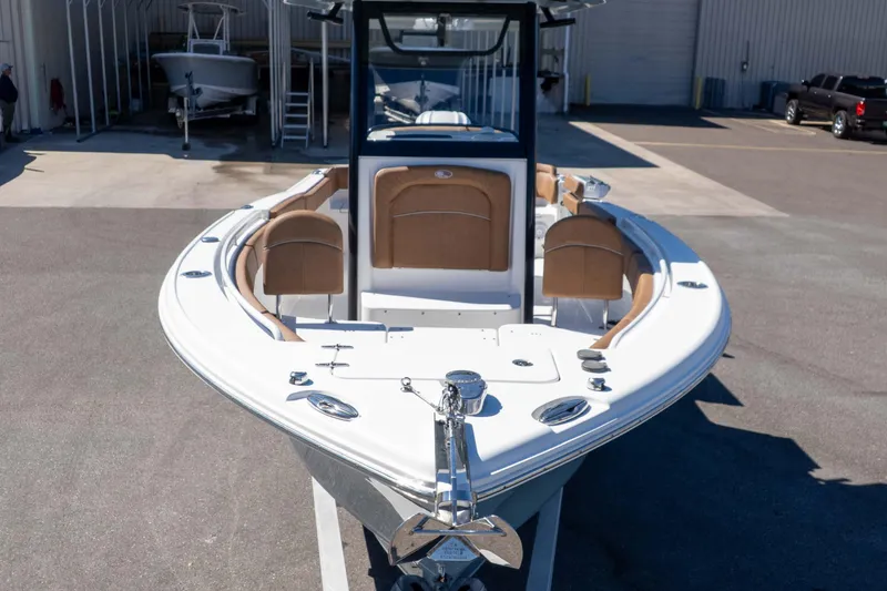 Slide: The Image of 2023 Sea Hunt Ultra 255 SE boat with sleek design and spacious seating. - 34