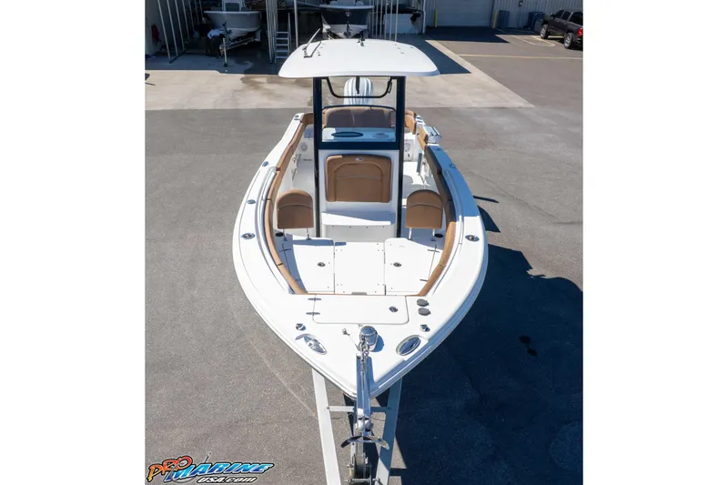 Slide: The Image of 2023 Sea Hunt Ultra 255 SE boat, top view, docked in a marina. - 36